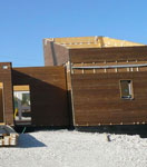 Maison bois en cours de construction : vue extérieure
