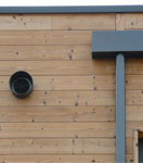 Vue du mur en bois (bardage et ossature) avec la VMC intégrée