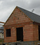 Vue extérieure construction maison en brique G7